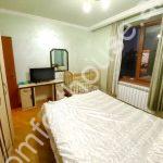 97459953